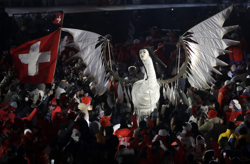 <p>Athletes surround a sculpture during the closing ceremony of the 2018 Winter Olympics in Pyeongchang, South Korea, Sunday, Feb. 25, 2018. (AP Photo/Chris Carlson) </p>