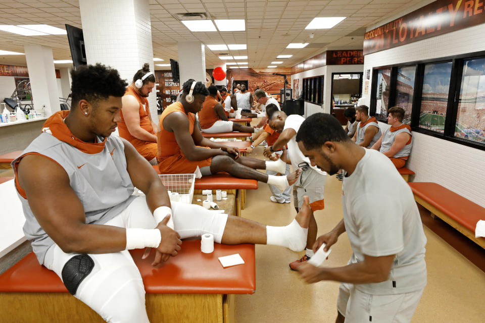 Texas Longhorns players are taped before the game against the LSU Tigers Saturday Sept. 7, 2019 at Darrell K Royal-Texas Memorial Stadium in Austin, Tx. ( Photo by Edward A. Ornelas )