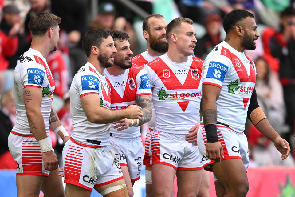 WOLLONGONG, AUSTRALIA – AUGUST 18: Ben Hunt of the Dragons celebrates a try with teammates during the round 24 NRL match between the St. George Illawarra Dragons and the Gold Coast Titans at WIN Stadium on August 18, 2024 in Wollongong, Australia. (Photo by Izhar Khan/Getty Images)