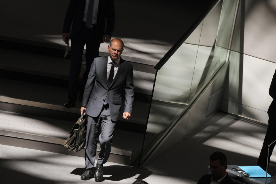 German Chancellor Olaf Scholz arrives for a speech at the German parliament Bundestag at the reichstag building in Berlin, Germany, Wednesday, June 22, 2022. (AP Photo/Markus Schreiber)