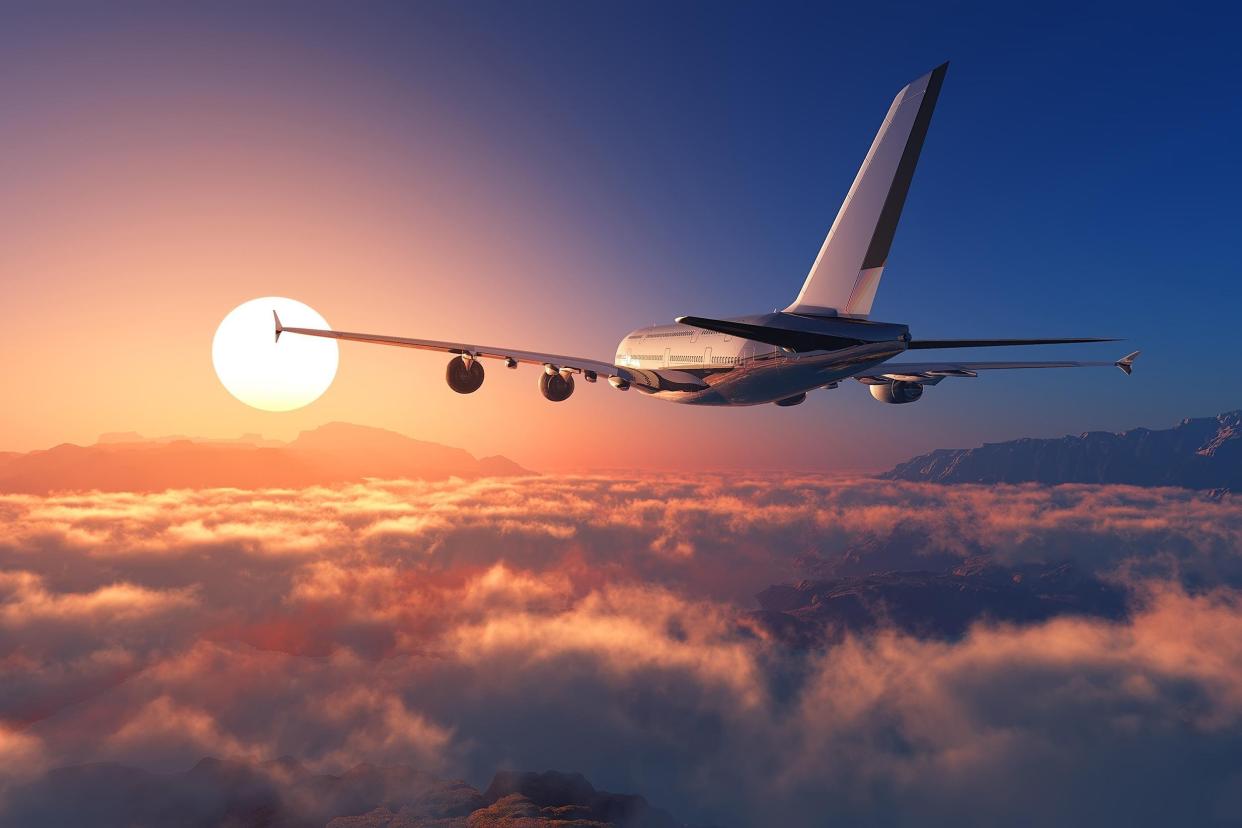 passenger plane above the clouds