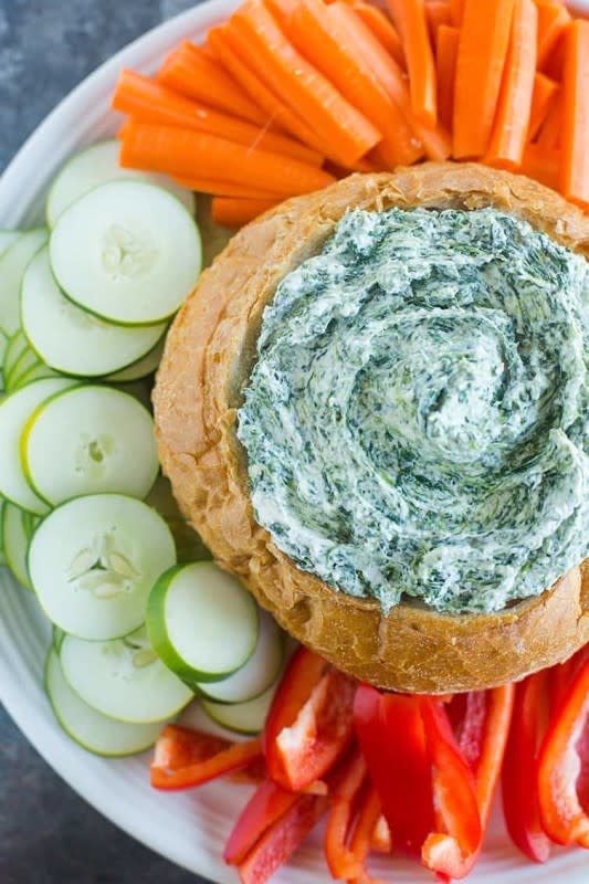 <p>Brown Eyed Baker</p><p>This classic dip gets lightened up a bit. </p><p><strong>Get the recipe: <a href="https://www.browneyedbaker.com/spinach-dip-recipe/" rel="nofollow noopener" target="_blank" data-ylk="slk:Spinach Dip;elm:context_link;itc:0;sec:content-canvas" class="link ">Spinach Dip</a></strong></p>