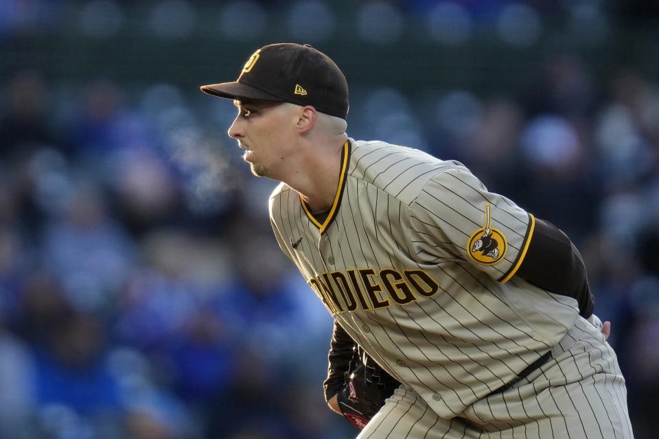 San Diego Padres starting pitcher Blake Snell prepares to throw during the first inning of the team's baseball game against the Chicago Cubs on Tuesday, April 25, 2023, in Chicago. (AP Photo/Erin Hooley)