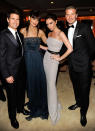 Tom Cruise and wife Katie Holmes -- who debuted a new, bang-enhanced 'do -- partied the night away with Victoria "Posh Spice" Beckham and her hubby, soccer star/underwear model, David.