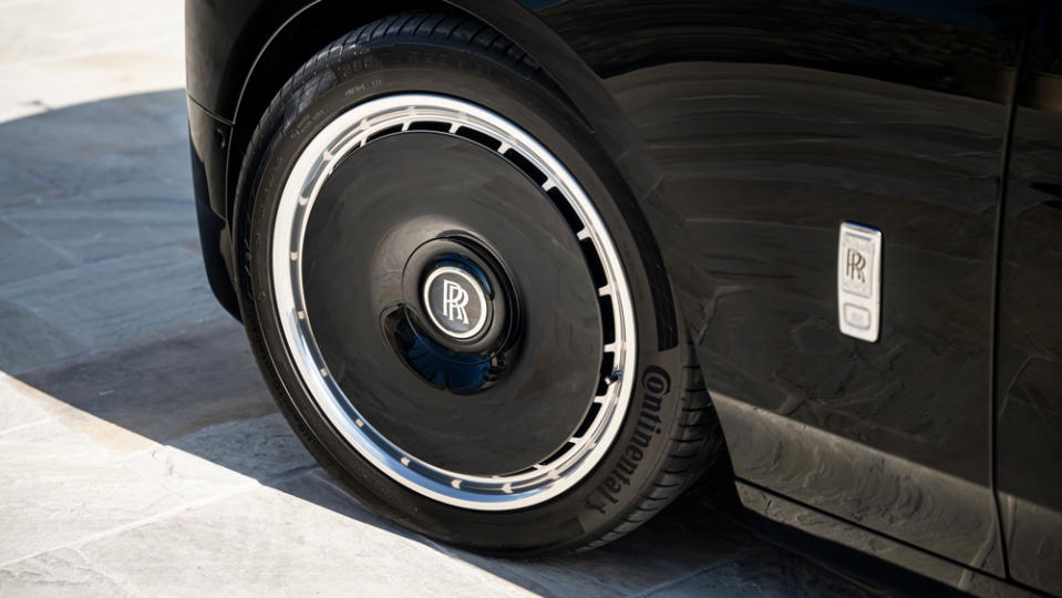 The optional 22-inch disc wheels are a tip of the hat to those on the very first Phantom. - Credit: James Lipman, courtesy of Rolls-Royce Motor Cars.