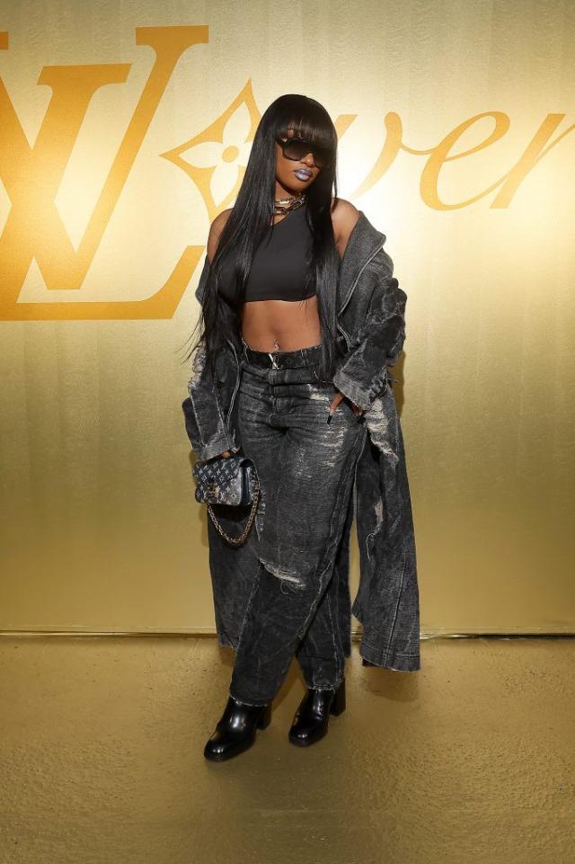 Pharrell Williams, left, and Helen Lasichanh attend the Louis Vuitton  Fall/Winter 2023-2024 ready-to-wear collection presented Monday, March 6,  2023 in Paris. (Vianney Le Caer/Invision/AP Stock Photo - Alamy