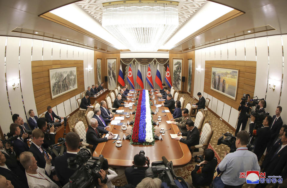 In this photo provided by the North Korean government, North Korean leader Kim Jong Un and Russian President Vladimir Putin hold a meeting at the state guest house in Pyongyang, North Korea, Wednesday, June 19, 2024. The content of this image is as provided and cannot be independently verified. Korean language watermark on image as provided by source reads: "KCNA" which is the abbreviation for Korean Central News Agency.(Korean Central News Agency/Korea News Service via AP)