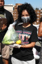 <p>Host Jhené Aiko volunteers at the Feed Your City Challenge Event with co-hosts Mustard and Roddy Ricch (not pictured) in Los Angeles on Saturday.</p>