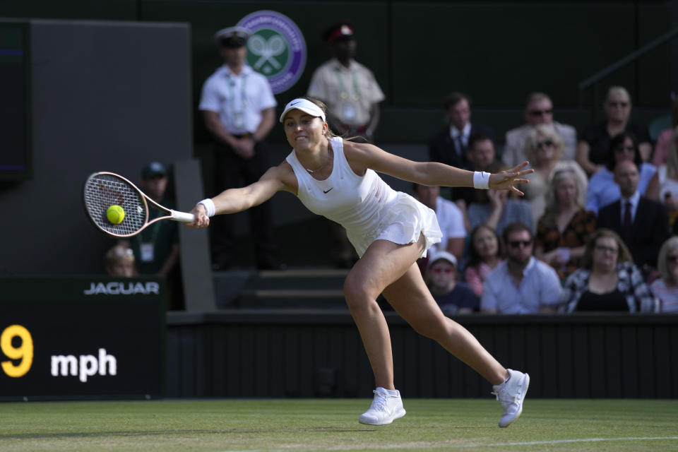 Spain's Paula Badosa returns the ball to Petra Kvitova of the Czech Republic during a third round women's singles match on day six of the Wimbledon tennis championships in London, Saturday, July 2, 2022. (AP Photo/Alastair Grant)