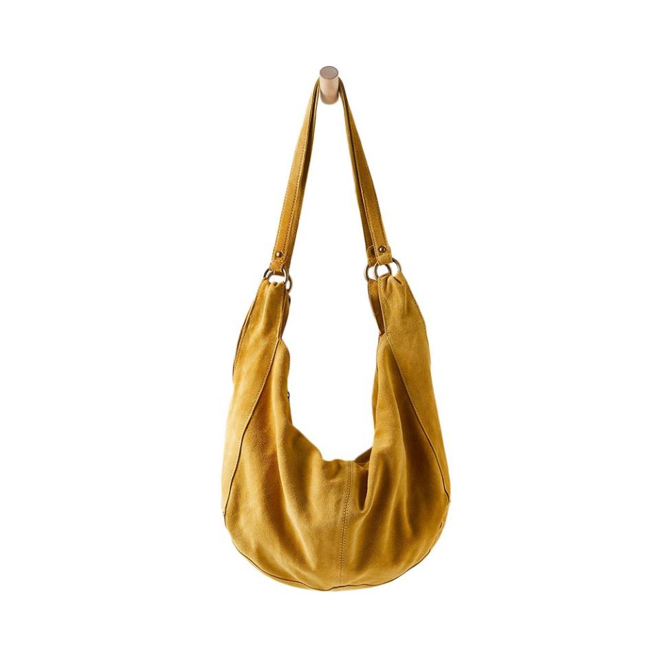 <p><a href="https://go.redirectingat.com?id=74968X1596630&url=https%3A%2F%2Fwww.freepeople.com%2Fshop%2Froma-suede-tote-bag%2F&sref=https%3A%2F%2Fwww.elle.com%2Ffashion%2Fshopping%2Fg45224536%2Fbest-suede-bags%2F" rel="nofollow noopener" target="_blank" data-ylk="slk:Shop Now;elm:context_link;itc:0;sec:content-canvas" class="link ">Shop Now</a></p><p>Roma Suede Tote Bag</p><p>freepeople.com</p><p>$98.00</p><span class="copyright">Courtesy of retailers</span>