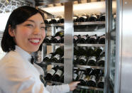 <p>Guests can choose from a variety of wines and spirits in the dining car’s “wine cellar.” (Photo: Asahi Shimbun via Getty Images) </p>