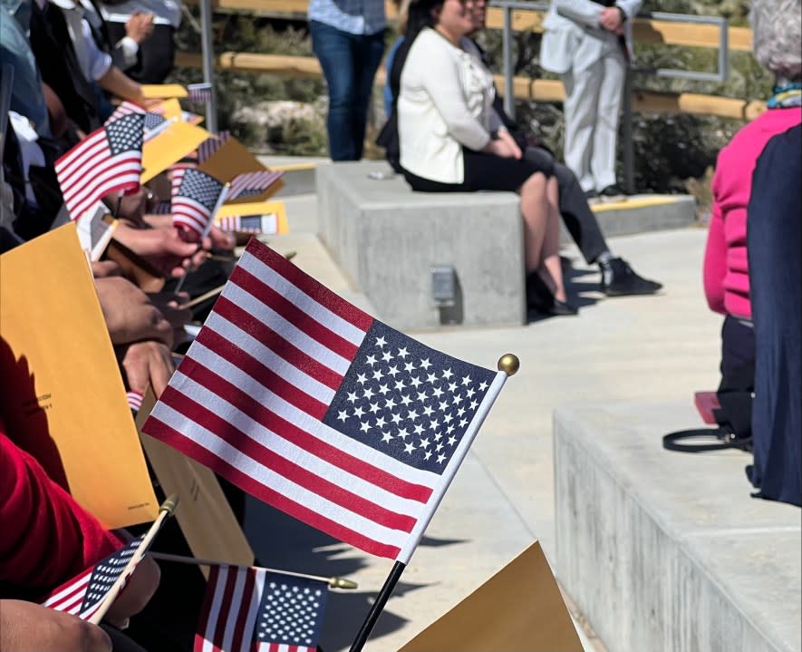 61 people from 20 different countries celebrated U.S. citizenship at Red Rock Canyon Saturday morning. (KLAS/Lauren Negrete)