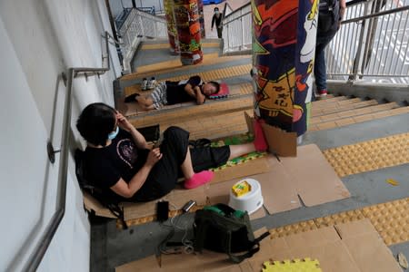 Seniors take part in a 48-hour sit-in protest in front of the police headquarters in Hong Kong