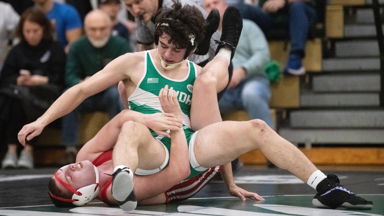 West Deptford's Chris Andujar, top, escapes a hold by Paulsboro's Austin Willetts during the 190 lb. bout of the wrestling meet held at West Deptford High School on Thursday, January 4, 2024. Andujar defeated Willetts, 10-2.