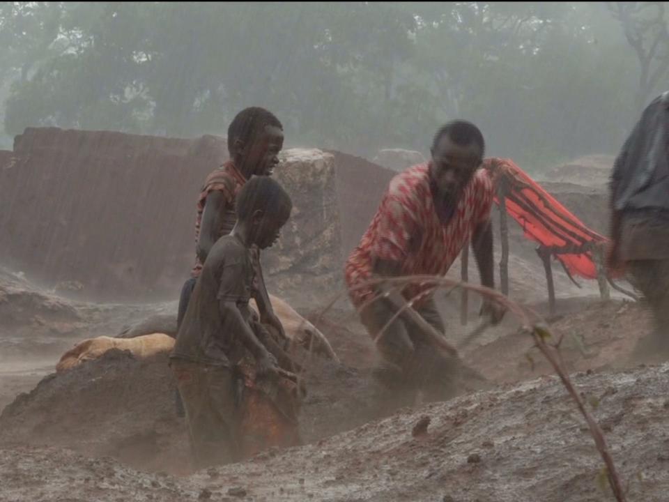 Children working in a cobalt mine.