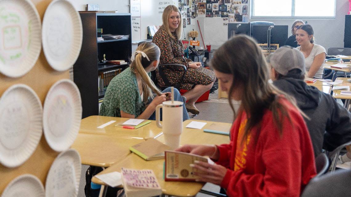 Teacher Sheridan Berg instructs her English class at Owyhee High School. Students in the class store their phones in pocket holders during the period to reduce distractions.