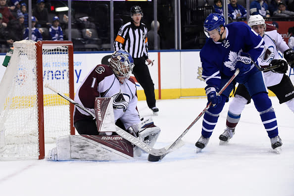 TORONTO, ON - DECEMBER 11: Toronto Maple Leafs Left Wing Zach Hyman (11) tips the puck into the glove of Colorado Avalanche Goalie Semyon Varlamov (1) during the regular season NHL game between the Colorado Avalanche and Toronto Maple Leafs on December 11, 2016 at Air Canada Centre in Toronto, ON. (Photo by Gerry Angus/Icon Sportswire via Getty Images)