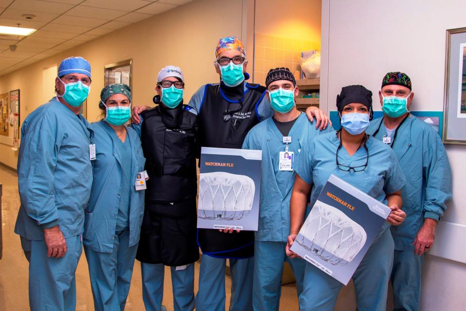 A Cardiovascular Institute of the South team that implanted the Houma-Thibodaux area's first cardiac Watchman device poses for a photo. They are (from left) registered nurses Dwayne Hornsby and Frankie LaFleur, Drs. Shane Prejean and Peter Fail, registered nurse Chasen Deese and radiology specialists Shaneka Stoot and Jared LeBouef.
