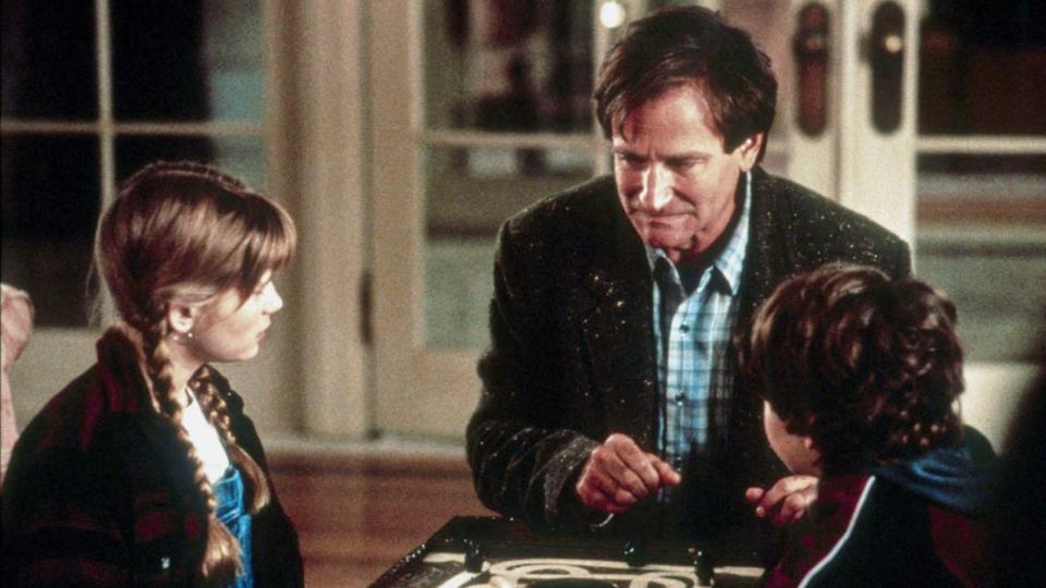 Kirsten Dunst, Robin Williams and Bradley Pierce in Jumanji