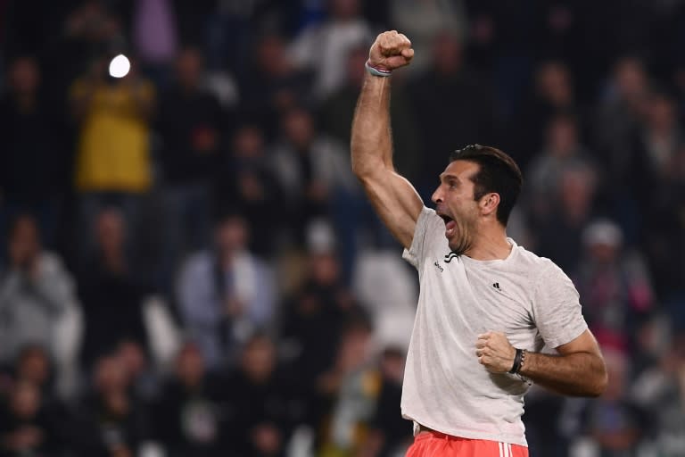 Juventus' goalkeeper Gianluigi Buffon celebrates at the end of their match against Sporting CP at the Juventus stadium on October 17, 2017 in Turin