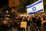 Israelis protest PM's alleged corruption and economic hardship from COVID-19 lockdowns