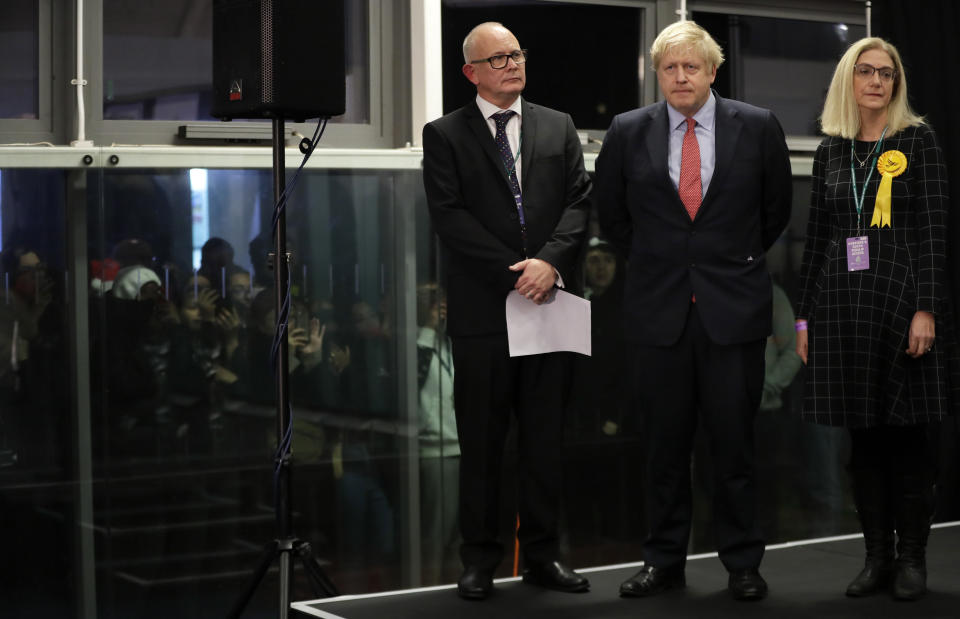 Britain's Prime Minister and Conservative Party leader Boris Johnson waits for the Uxbridge and South Ruislip constituency count declaration at Brunel University in Uxbridge, London, Friday, Dec. 13, 2019. (AP Photo/Kirsty Wigglesworth)