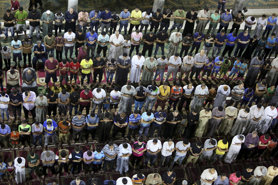 Palestinians pray in Gaza City