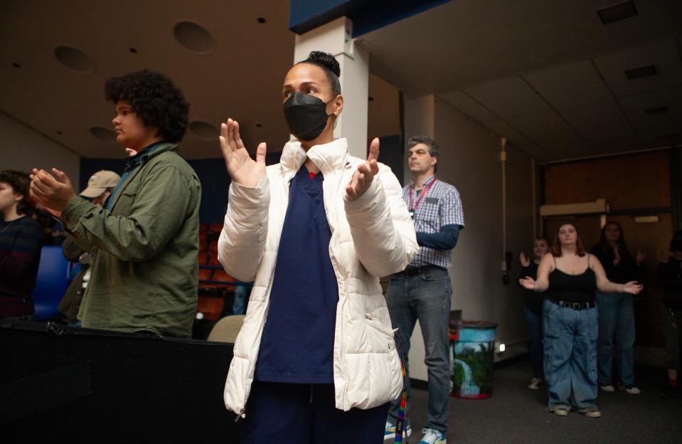 Teacher Keri Pilgrim, center, joins in clapping to a rap song during the Black Excellence Week Assembly at Churchill High School Feb 22, 2024 in Eugene.