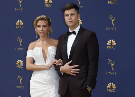 70th Primetime Emmy Awards– Arrivals – Los Angeles, California, U.S., 17/09/2018 – Scarlett Johansson and host Colin Jost. REUTERS/Kyle Grillot