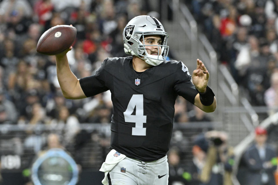 Las Vegas Raiders quarterback Aidan O'Connell (4) passes against the Kansas City Chiefs during the second half of an NFL football game, Sunday, Nov. 26, 2023, in Las Vegas. (AP Photo/David Becker)