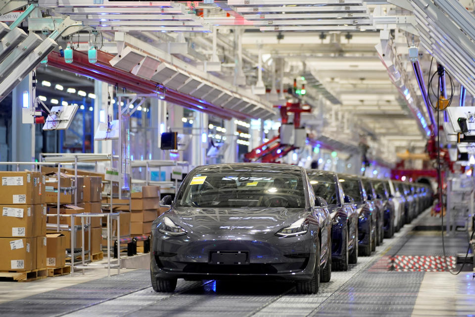 Tesla China-made Model 3 vehicles are seen during a delivery event at its factory in Shanghai, China January 7, 2020. REUTERS/Aly Song
