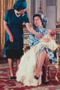 <p>Queen Elizabeth shares a moment with Princess Anne and <a href="https://www.townandcountrymag.com/society/tradition/a19814042/peter-phillips-facts/" rel="nofollow noopener" target="_blank" data-ylk="slk:her son Peter Phillips;elm:context_link;itc:0;sec:content-canvas" class="link ">her son Peter Phillips</a> on the day of his christening.</p>