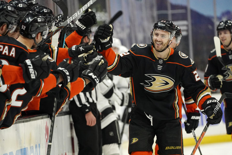 Anaheim Ducks defenseman Kevin Shattenkirk celebrates his goal with teammates during the first period of an NHL hockey game against the Los Angeles Kings Monday, March 8, 2021, in Anaheim, Calif. (AP Photo/Mark J. Terrill)