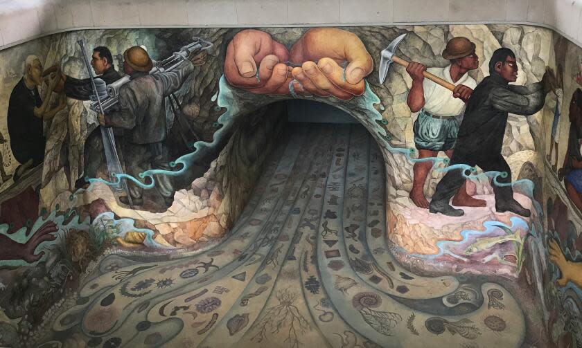 In this photo taken on Sept. 5, 2017, a little-known mural by Diego Rivera, "Water, the Source of Life," is seen inside a monument to Mexico City's water system called the Carcamo de Dolores, or the Dolores Sump. Originally painted to be viewed underwater, the pool was drained when it became clear that the work would slowly be ruined. The hydraulic structure is located inside the Second Section of the Mexican capital's Chapultepec Park. (AP Photo/Anita Snow)