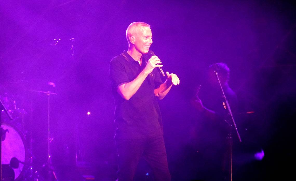 Curt Smith smiles as he sings during the Tears for Fears concert at Coastal Credit Union Music Park in Raleigh, N.C., Saturday, July 8, 2023.