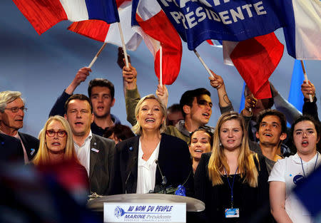 Marine Le Pen, French National Front (FN) political party leader and candidate for French 2017 presidential election, smiles to supporters at the end of a political rally in Bordeaux, France, April 2, 2017. REUTERS/Regis Duvignau