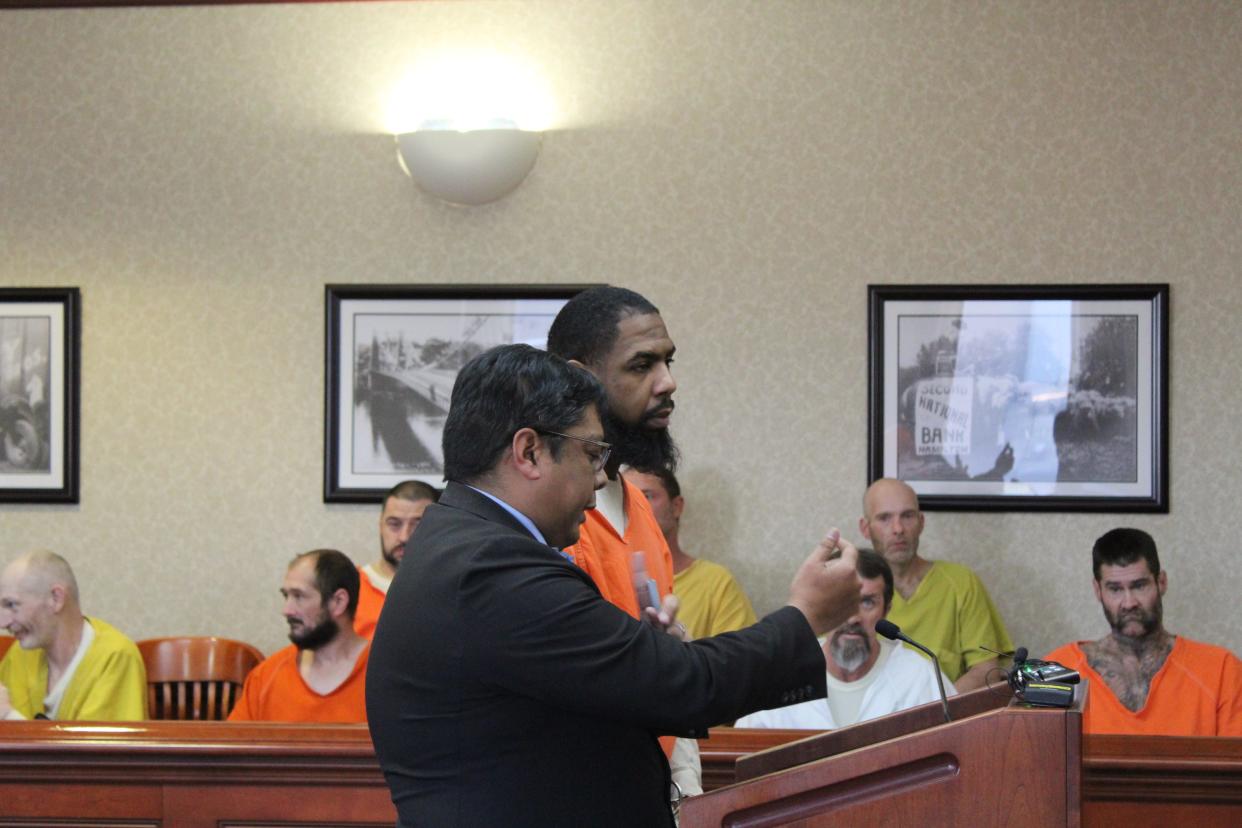 Darnell Dollar (Right) stands next to his lawyer, Billy Guinigundo, during his sentencing in Butler County Common Pleas Court on Thursday.