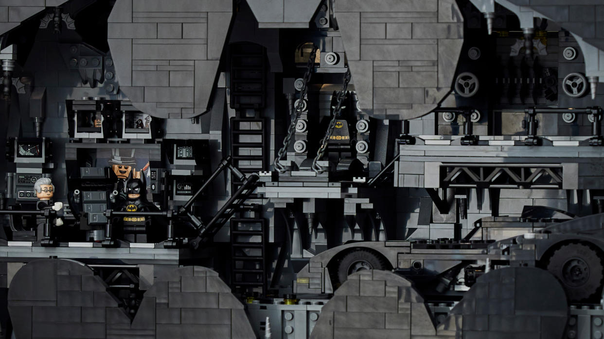  A view of the Lego Batman Returns Batcave through the bat symbol 