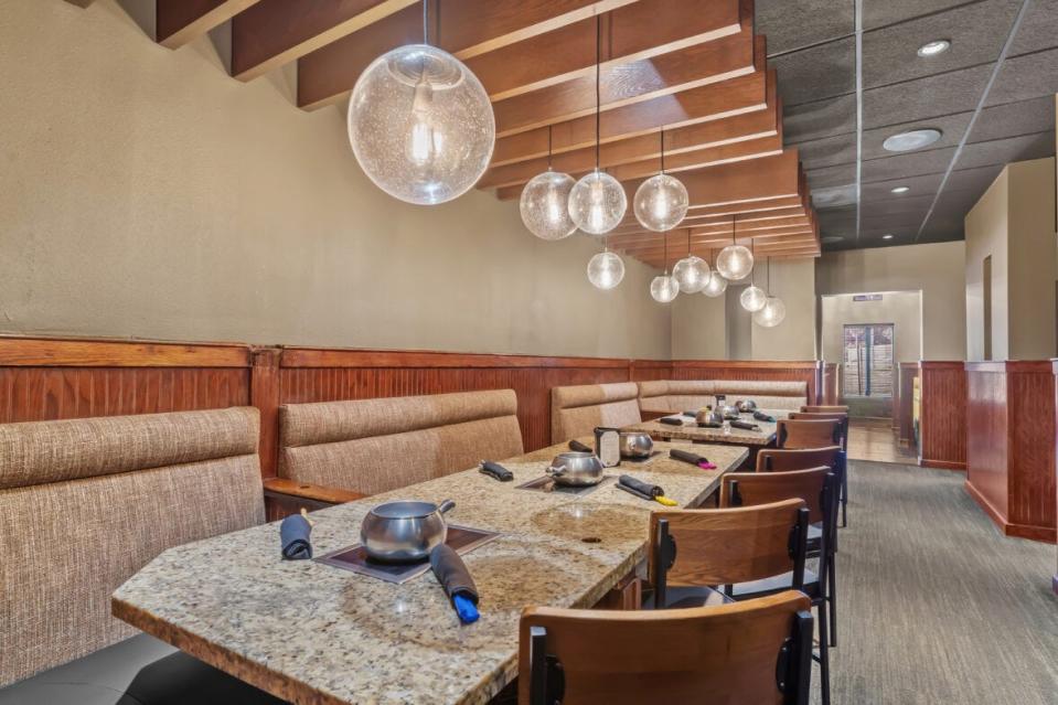 Tallahassee's Melting Pot has all-new finishes, including fabrics, paint, artwork, and lighting.