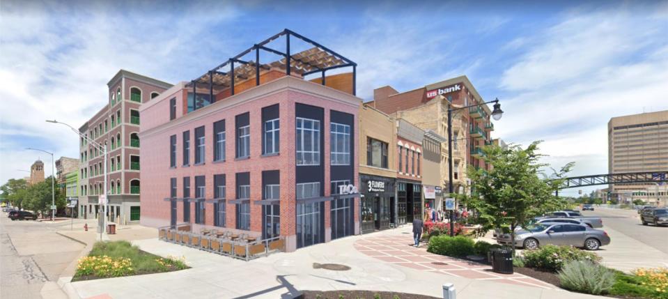 Cody Foster's development company plans to build a two-story restaurant, which would feature the first full-service, rooftop deck in downtown Topeka.