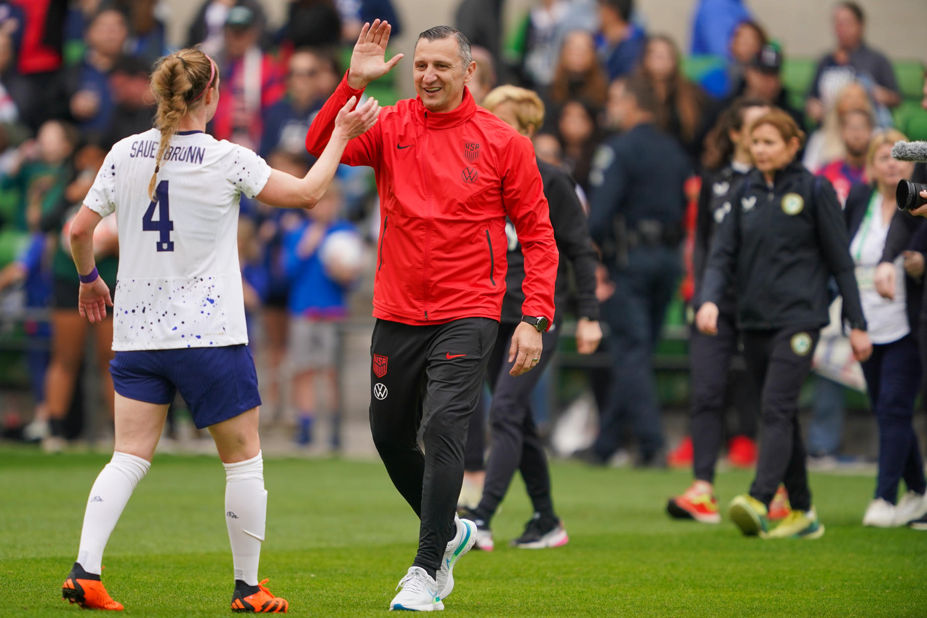 USWNT head coach Vlatko Andonovski high fives Becky Sauerbrunn during a game against Ireland at Q2 Stadium on April 8 in Austin, Texas. (Photo by John Todd/USSF/Getty Images)