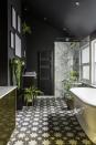 <p>This dark bathroom really comes to life with decorative floor tiles, brass furniture and lush plants– even the ceiling is painted black.</p><p><a class="link " href="https://www.housebeautiful.com/uk/decorate/bathroom/a23705794/black-gold-bathroom-jess-hurrell/" rel="nofollow noopener" target="_blank" data-ylk="slk:TAKE A TOUR;elm:context_link;itc:0;sec:content-canvas">TAKE A TOUR</a></p>