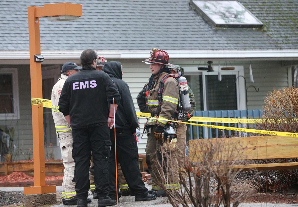 Kittery police and fire personnel respond to Foxwell Apartments on Manson Avenue for a fire during heavy rain Thursday, March 28, 2024.