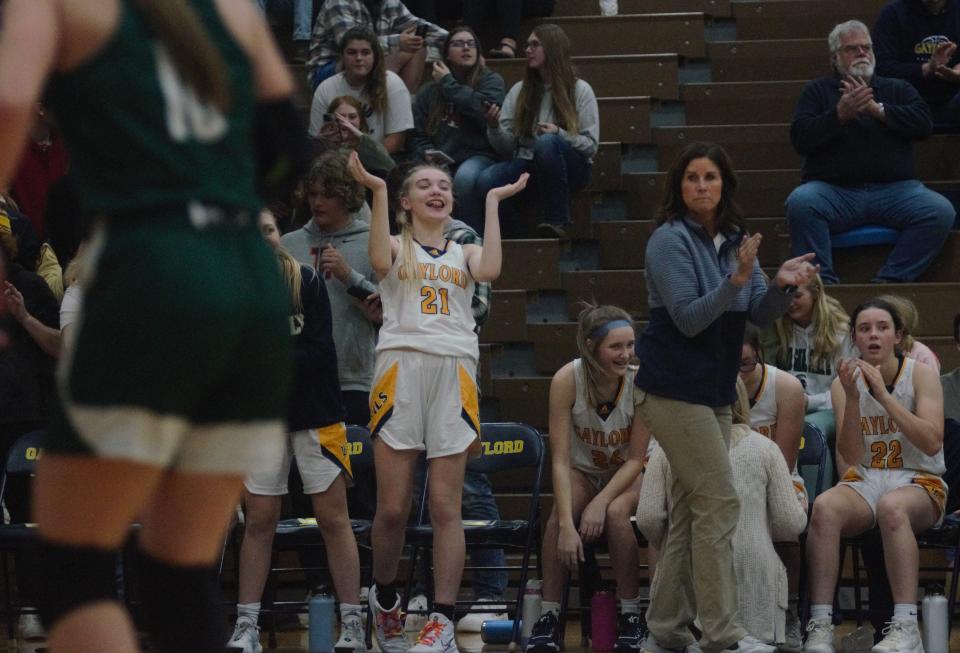 The Gaylord bench celebrates during a girls basketball matchup between Gaylord and Grayling on Tuesday, November 29.