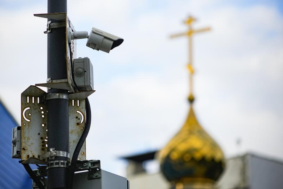 FILE - A surveillance camera sits on a utility pole in Moscow, Russia, Sunday, May 21, 2023. It's becoming increasingly difficult for Russians to escape government scrutiny. Activists say Putin’s government has managed to harness digital technology to surveil, censor and control Russians — new territory in a nation with a long history of spying on its citizens. (AP Photo, file)