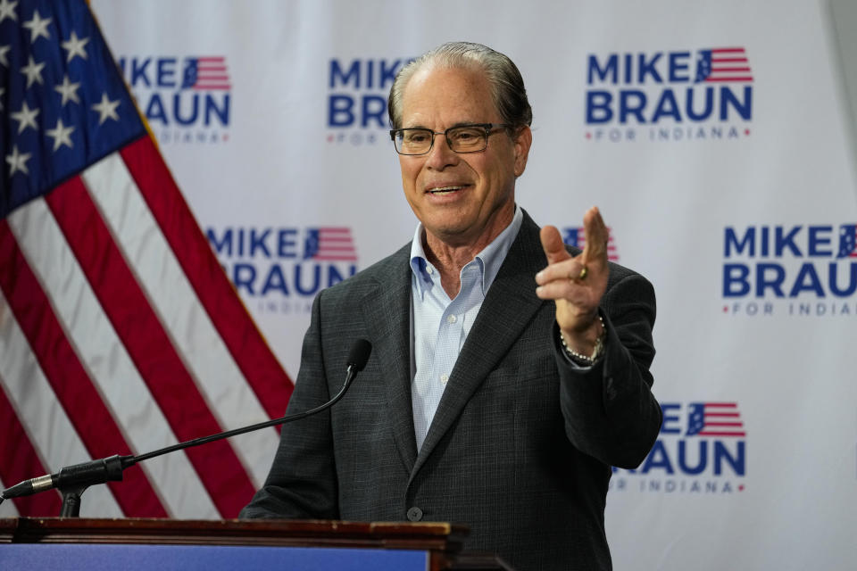 FILE - U.S. Sen. Mike Braun, R-Ind., announces that he will for Indiana governor in 2024, Dec. 12, 2022, in Indianapolis. In an unusually crowded gubernatorial primary, five Republican candidates in Indiana, including Braun, are trying to stand out before the election day in May 2024. The race is expected to be the most expensive in the office's history, with millions raised and spent over the last year according to campaign finance reports filed Wednesday, Jan. 17, 2024. (AP Photo/Michael Conroy, File)