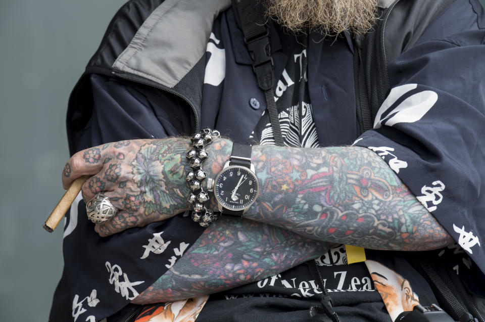 <p>A man sits with his cigar at the London Tattoo convention at Tobacco Dock on Sept. 23, 2017 in London, England. (Photo: James D. Morgan/Getty Images) </p>