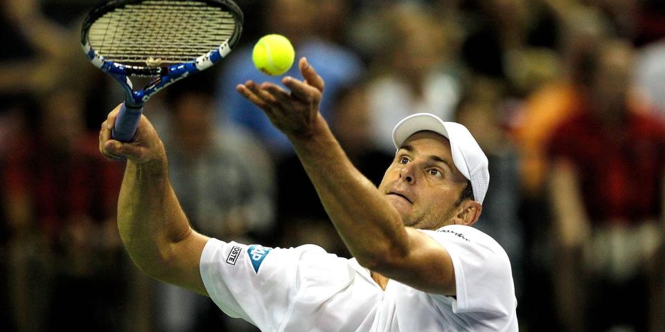 Andy Roddick serves at the 2011 Davis Cup.