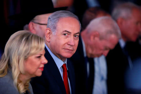 FILE PHOTO: Israeli Prime Minister Benjamin Netanyahu and his wife Sara attend an inauguration ceremony for a fortified emergency room at the Barzilai Medical Center in Ashkelon, southern Israel, February 20, 2018. REUTERS/Amir Cohen/File Photo
