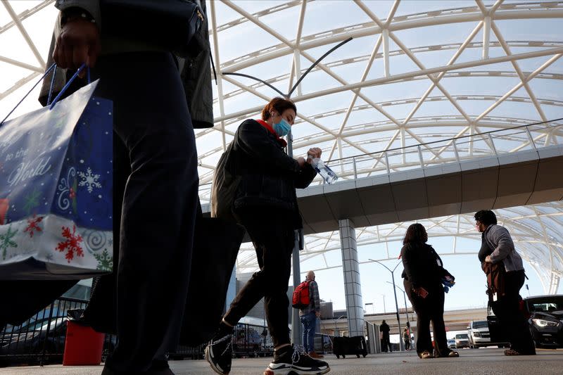 Travelers depart Hartsfield–Jackson Atlanta International Airport ahead of the Thanksgiving holiday